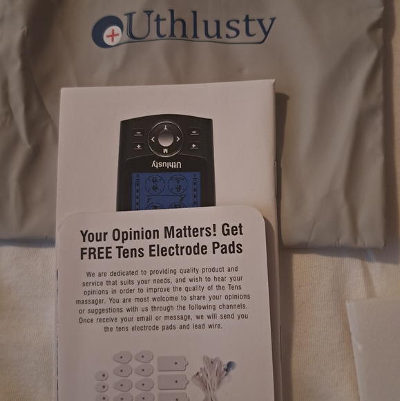 TENS UNIT IN BOX - Picture 2 of 5